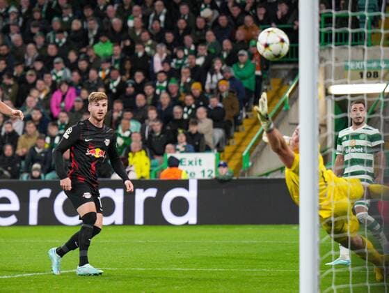 Mandatory Credit: Photo by Stuart Wallace Shutterstock (13455499ax) Timo Werner of RB Leipzig heads past Celtic goalkeeper Joe Hart to give Leipzig a 0-1 lead. Celtic v RB Leipzig, UEFA Champions League, Group F, Football, Celtic Park, Glasgow, UK - 11 Oct 2022 EDITORIAL USE ONLY No use with unauthorised audio, video, data, fixture lists, club league logos or live services. Online in-match use limited to 120 images, no video emulation. No use in betting, games or single club league player publications. Celtic v RB Leipzig, UEFA Champions League, Group F, Football, Celtic Park, Glasgow, UK - 11 Oct 2022 EDITORIAL USE ONLY No use with unauthorised audio, video, data, fixture lists, club league logos or live services. Online in-match use limited to 120 images, no video emulation. No use in betting, games or single club league player publications. Copyright: xStuartxWallace Shutterstockx 13455499ax