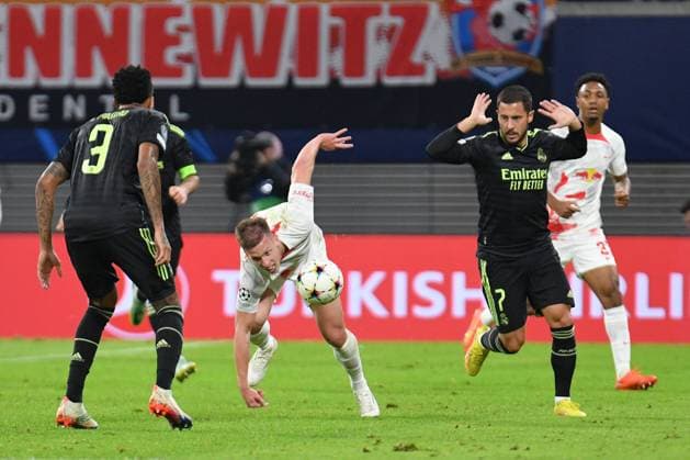 Eden Hazard Real Madrid r , Eder Gabriel Militao Real Madrid li and Dani Olmo RB Leipzig center RB Leipzig vs Real Madrid, Football, Champions League, Matchday 5, Season 2022 2023, 25 10 2022 DFB DFL REGULATIONS PROHIBIT ANY USE OF PHOTOGRAPHS AS IMAGE SEQUENCES AND OR QUASI VIDEO RB Leipzig vs Real Madrid, Football, Champions League, Matchday 5, Season 2022 2023, 25 10 2022 Leipzig. Copyright: xEibner-Pressefoto BertxHarzerx EP_EER