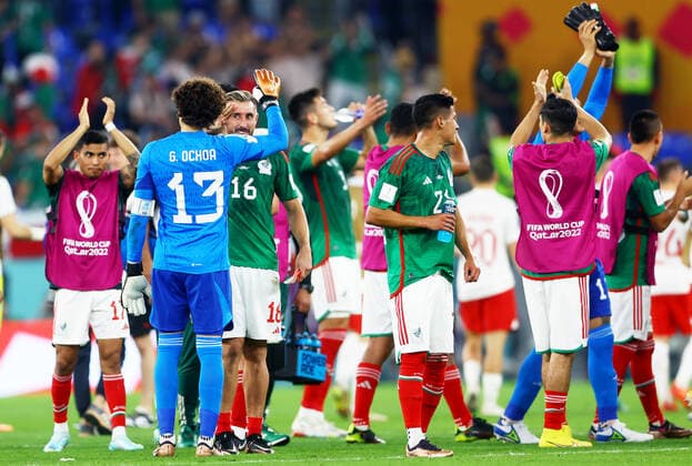 Mandatory Credit: Photo by Kieran McManus Shutterstock (13626428by) Hector Herrera of Mexico salutes Goalkeeper Guillermo Ochoa of Mexico at full time after he saved a penalty. Mexico v Poland, FIFA World Cup, WM, Weltmeisterschaft, Fussball 2022, Group C, Football, Stadium 974, Doha, Qatar - 22 Nov 2022 Editorial Use Only Mexico v Poland, FIFA World Cup 2022, Group C, Football, Stadium 974, Doha, Qatar - 22 Nov 2022 Editorial Use Only Copyright: xKieranxMcManus Shutterstockx 13626428by