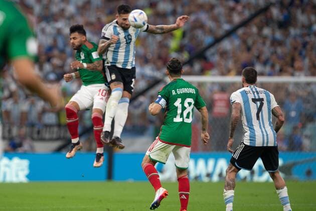 RECORD DATE NOT STATED FIFA World Cup, WM, Weltmeisterschaft, Fussball Qatar 2022 Argentina vs Mexico (L-R), Alexis Vega of Mexico and Nicolas Otamendi of Argentina during the game Argentina vs Mexican national team, Nationalteam (Mexico), Corresponding to Group C of the FIFA World Cup Qatar 2022, at Lusail Stadium, Lusail, Doha, November 26, 2022. <br><br> (I-D), Alexis Vega de Mexico y Nicolas Otamendi de Argentina durante el partido Argentina vs Seleccion Nacional Mexicana (Mexico), correspondiente al Grupo C de la Copa Mundial de la FIFA Qatar 2022, en el Estadio Lusail, Lusail, Doha, 26 de noviembre de 2022. LUSAIL DOHA QATAR Copyright: xDavidxLeahx 20221126_12026