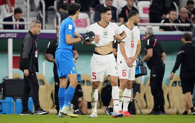 Mandatory Credit: Photo by Dave Shopland Shutterstock (13640369bd) Goalkeeper Yassine Bounou and Nayef Aguerd of Morocco. Canada v Morocco, FIFA World Cup, WM, Weltmeisterschaft, Fussball 2022, Group F, Football, Al Thumama Stadium, Doha, Qatar - 01 Dec 2022 Editorial Use Only Canada v Morocco, FIFA World Cup 2022, Group F, Football, Al Thumama Stadium, Doha, Qatar - 01 Dec 2022 Editorial Use Only Copyright: xDavexShopland Shutterstockx 13640369bd