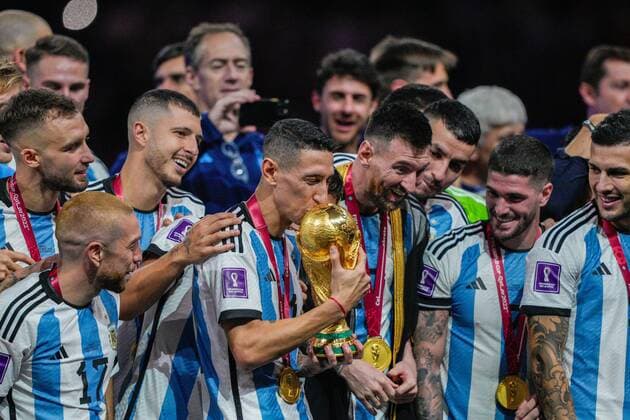 Mandatory Credit: Photo by Dave Shopland Shutterstock (13670813dk) Angel Di Maria of Argentina kisses the FIFA World Cup, WM, Weltmeisterschaft, Fussball trophy alongside Lionel Messi of Argentina Argentina v France, FIFA World Cup 2022, Final, Football, Lusail Stadium, Al Daayen, Qatar - 18 Dec 2022 Editorial Use Only Argentina v France, FIFA World Cup 2022, Final, Football, Lusail Stadium, Al Daayen, Qatar - 18 Dec 2022 Editorial Use Only Copyright: xDavexShopland Shutterstockx 13670813dk