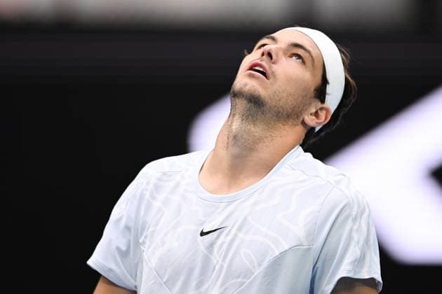 Mandatory Credit: Photo by James Gouley Shutterstock (13716770ck) Taylor Fritz looks dejected during his second round match Australian Open, Day Four, Tennis, Melbourne Park, Melbourne, Australia - 19 Jan 2023 Australian Open, Day Four, Tennis, Melbourne Park, Melbourne, Australia - 19 Jan 2023 Copyright: xJamesxGouley Shutterstockx 13716770ck
