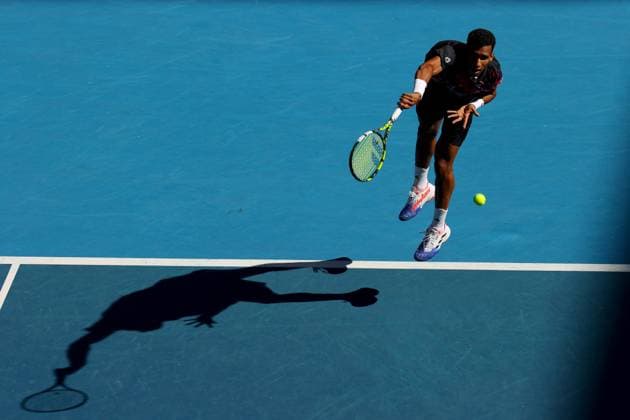 Mandatory Credit: Photo by Ella Ling Shutterstock (13716910aq) Felix Auger Aliassime of Canada in action Australian Open, Day Five, Tennis, Melbourne Park, Melbourne, Australia - 20 Jan 2023 Australian Open, Day Five, Tennis, Melbourne Park, Melbourne, Australia - 20 Jan 2023 Copyright: xEllaxLing Shutterstockx 13716910aq