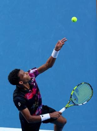 Mandatory Credit: Photo by Ella Ling Shutterstock (13716910af) Felix Auger Aliassime of Canada in action Australian Open, Day Five, Tennis, Melbourne Park, Melbourne, Australia - 20 Jan 2023 Australian Open, Day Five, Tennis, Melbourne Park, Melbourne, Australia - 20 Jan 2023 Copyright: xEllaxLing Shutterstockx 13716910af