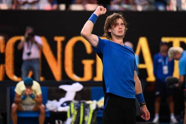Mandatory Credit: Photo by James Gourley Shutterstock (13729780ex) Holger Rune looks dejected (left) while Andrey Rublev celebrates victory after winning his fourth round match Australian Open, Day Eight, Tennis, Melbourne Park, Melbourne, Australia - 23 Jan 2023 Australian Open, Day Eight, Tennis, Melbourne Park, Melbourne, Australia - 23 Jan 2023 Copyright: xJamesxGourley Shutterstockx 13729780ex