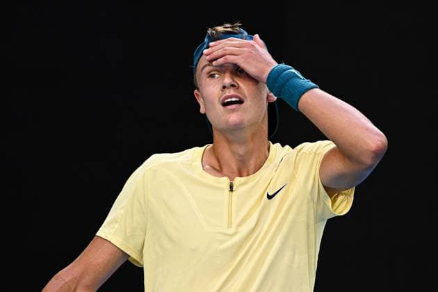 Mandatory Credit: Photo by James Gourley Shutterstock (13729780hg) Holger Rune shows frustration during his fourth round match Australian Open, Day Eight, Tennis, Melbourne Park, Melbourne, Australia - 23 Jan 2023 Australian Open, Day Eight, Tennis, Melbourne Park, Melbourne, Australia - 23 Jan 2023 Copyright: xJamesxGourley Shutterstockx 13729780hg