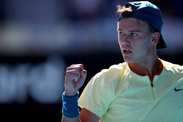Mandatory Credit: Photo by Ella Ling Shutterstock (13729779eg) Holger Rune of Denmark celebrates Australian Open, Day Eight, Tennis, Melbourne Park, Melbourne, Australia - 23 Jan 2023 Australian Open, Day Eight, Tennis, Melbourne Park, Melbourne, Australia - 23 Jan 2023 Copyright: xEllaxLing Shutterstockx 13729779eg