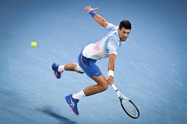 Mandatory Credit: Photo by James Gourley Shutterstock (13729780ic) Novak Djokovic in action during his fourth round match Australian Open, Day Eight, Tennis, Melbourne Park, Melbourne, Australia - 23 Jan 2023 Australian Open, Day Eight, Tennis, Melbourne Park, Melbourne, Australia - 23 Jan 2023 Copyright: xJamesxGourley Shutterstockx 13729780ic