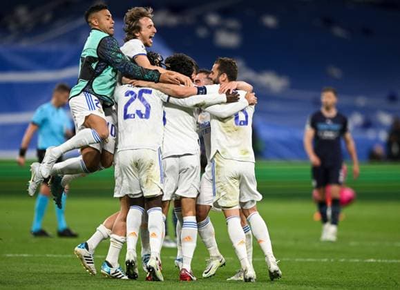 Mandatory Credit: Photo by ANL Shutterstock (13743794y) Real Madrid players celebrate Real Madrid v Manchester City, Champions League semi-finals, 2nd leg Andy Hooper Daily Mail Real Madrid v Manchester City, Bernabeu, Spain - 04 May 2022 EDITORIAL USE ONLY No use with unauthorised audio, video, data, fixture lists, club league logos or live services. Online in-match use limited to 120 images, no video emulation. No use in betting, games or single club league player publications. Consent for book publication must be agreed with Shutterstock before use. It is the picture user s responsibility to adhere to all restrictions Real Madrid v Manchester City, Bernabeu, Spain - 04 May 2022 EDITORIAL USE ONLY No use with unauthorised audio, video, data, fixture lists, club league logos or live services. Online in-match use limited to 120 images, no video emulation. No use in betting, games or single club league player publications. Consent Copyright: xANL Shutterstockx 13743794y