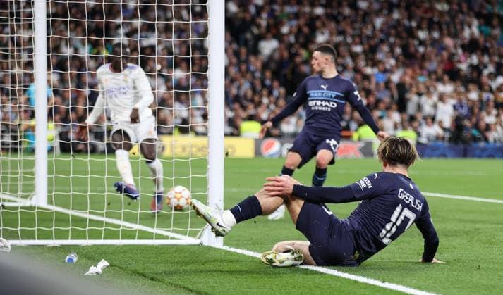 Mandatory Credit: Photo by ANL Shutterstock (13743794ad) Jack Grealish of Manchester City has a shot at goal which narrowly misses in extra time Real Madrid v Manchester City, Champions League semi-finals, 2nd leg Andy Hooper Daily Mail Real Madrid v Manchester City, Bernabeu, Spain - 04 May 2022 EDITORIAL USE ONLY No use with unauthorised audio, video, data, fixture lists, club league logos or live services. Online in-match use limited to 120 images, no video emulation. No use in betting, games or single club league player publications. Consent for book publication must be agreed with Shutterstock before use. It is the picture user s responsibility to adhere to all restrictions Real Madrid v Manchester City, Bernabeu, Spain - 04 May 2022 EDITORIAL USE ONLY No use with unauthorised audio, video, data, fixture lists, club league logos or live services. Online in-match use limited to 120 images, no video emulation. No use in betting, games or single club league player publications. Consent Copyright: xANL Shutterstockx 13743794ad