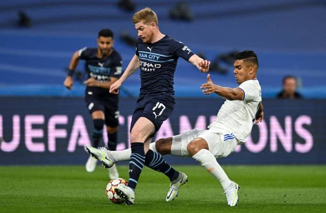 Mandatory Credit: Photo by ANL Shutterstock (13743794ai) Kevin De Bruyne of Manchester City and Casemiro of Real Madrid Real Madrid v Manchester City, Champions League semi-finals, 2nd leg Andy Hooper Daily Mail Real Madrid v Manchester City, Bernabeu, Spain - 04 May 2022 EDITORIAL USE ONLY No use with unauthorised audio, video, data, fixture lists, club league logos or live services. Online in-match use limited to 120 images, no video emulation. No use in betting, games or single club league player publications. Consent for book publication must be agreed with Shutterstock before use. It is the picture user s responsibility to adhere to all restrictions Real Madrid v Manchester City, Bernabeu, Spain - 04 May 2022 EDITORIAL USE ONLY No use with unauthorised audio, video, data, fixture lists, club league logos or live services. Online in-match use limited to 120 images, no video emulation. No use in betting, games or single club league player publications. Consent Copyright: xANL Shutterstockx 13743794ai