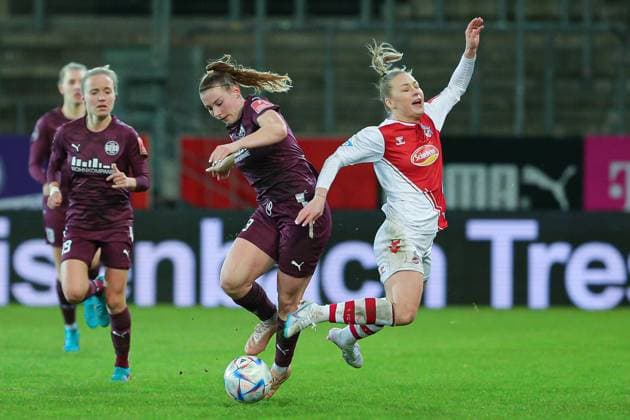 f l Ramona Maier SGS Essen, 9 and Weronika Zawistowska 1 FC Köln, 24 in duel, duel, dynamic, action, game scene, THE DFB REGULATIONS PROHIBIT ANY USE OF PHOTOGRAPHS AS IMAGE SEQUENCES AND OR QUASI VIDEO , 03 02 2023, Essen Germany , Football, Flyeralarm Womens Bundesliga, SGS Essen 1 FC Cologne xobx