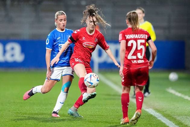 v li Vanessa Leimenstoll TSG, 27 , Alena Bienz Cologne, 11 , Laura Donhauser Cologne, 25 , duel, game scene, duel, duel, tackle, tackling, dynamics, action, action, 12 02 2023, Sinsheim Hoffenheim Germany , Football, Flyeralarm Frauen Bundesliga, TSG 1899 Hoffenheim 1 FC Köln, 12 02 2023, Sinsheim Hoffenheim Germany , Football, Flyeralarm Frauen Bundesliga, TSG 1899 Hoffenheim 1 FC Köln, DFB DFL REGULATES PROHIBIT ANY USE OF PHOTOGRAPHS AS IMAGE SEQUENCES AND OR QUASI VIDEO xozx