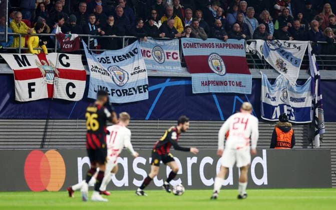 Mandatory Credit: Photo by James Marsh Shutterstock (13775724ar) Travelling Manchester City fans watch on. RB Leipzig v Manchester City, UEFA Champions League, Round of 16, First Leg, Football, Red Bull Arena, Leipzig, UK - 22 Feb 2023 EDITORIAL USE ONLY No use with unauthorised audio, video, data, fixture lists, club league logos or live services. Online in-match use limited to 120 images, no video emulation. No use in betting, games or single club league player publications. RB Leipzig v Manchester City, UEFA Champions League, Round of 16, First Leg, Football, Red Bull Arena, Leipzig, UK - 22 Feb 2023 EDITORIAL USE ONLY No use with unauthorised audio, video, data, fixture lists, club league logos or live services. Online in-match use limited to 120 images, no video emulation. No use in betting, games or single club league player publications. Copyright: xJamesxMarsh Shutterstockx 13775724ar