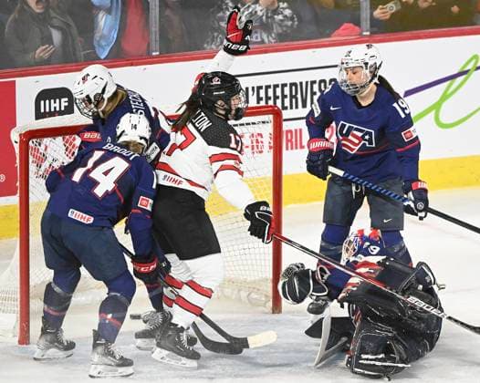 February 22, 2023, Laval, PQ, Canada: Ella Shelton (17) of Canada reacts after scoring against goaltender Nicole Hensley of the USA as USA s Jincy Dunne (19) looks on during first period Rivalry Series hockey action in Laval, Que., Wednesday, February 22, 2023. Nicole Hensley, Ella Shelton, Jincy Dunne, - ZUMAc35_ 20230222_zaf_c35_165 Copyright: xGrahamxHughesx