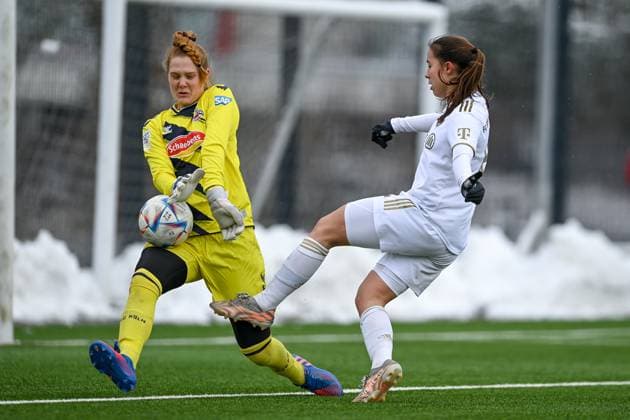 f l Kristin Krammer goalkeeper, Cologne, 1 parries the shot of Amelie Schuster FCB, 8 in duel, duel, tackle, dynamic, action, action, 26 02 2023, Munich Germany , Football,2 Women Bundesliga, FC Bayern München II 1 FC Köln II, DFB DFL REGULATIONS PROHIBIT ANY USE OF PHOTOGRAPHS AS IMAGE SEQUENCES AND OR QUASI VIDEO xslx