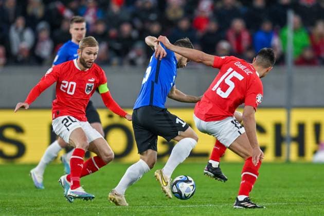 SOCCER - UEFA EURO, EM, Europameisterschaft,Fussball 2024 Quali, AUT vs EST LINZ,AUSTRIA,27.MAR.23 - SOCCER - European Qualifiers 2024, OEFB international match, Länderspiel, Nationalmannschaft Austria vs Estonia. Image shows Konrad Laimer (AUT), Rauno Sappinen (EST) and Flavius Daniliuc (AUT). GEPAxpictures xChristianxMoser