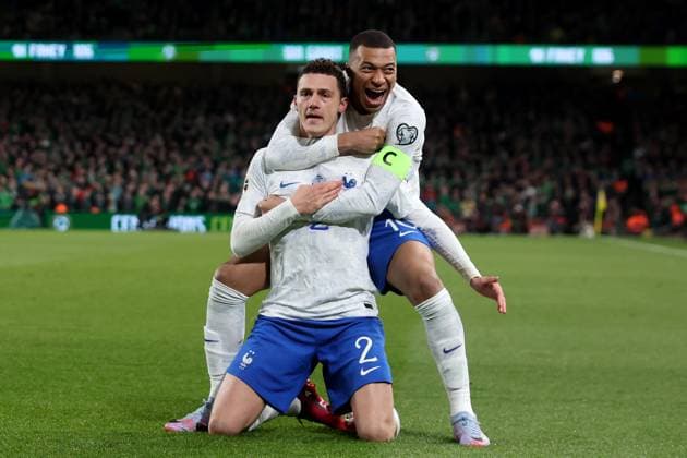 Mandatory Credit: Photo by Paul Greenwood Shutterstock (13847018v) Benjamin Pavard of France celebrates scoring his side s first goal with Kylian Mbappe to make the score 0-1 Republic of Ireland v France, UEFA European Championship, EM, Europameisterschaft 2024 Qualifying, Group B, Football, Aviva Stadium, Dublin, Ireland - 27 Mar 2023 EDITORIAL USE ONLY No use with unauthorised audio, video, data, fixture lists, club league logos or live services. Online in-match use limited to 120 images, no video emulation. No use in betting, games or single club league player publications. Republic of Ireland v France, UEFA European Championship 2024 Qualifying, Group B, Football, Aviva Stadium, Dublin, Ireland - 27 Mar 2023 EDITORIAL USE ONLY No use with unauthorised audio, video, data, fixture lists, club league logos or live services. Online in-match use limited to 120 images, no video emulation. No use in betting, games or single club league player publications. Copyright: xPaulxGreenwood Shutterstockx 13847018v