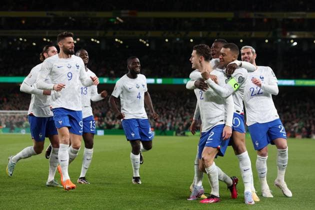 Mandatory Credit: Photo by Paul Greenwood Shutterstock (13847018al) Benjamin Pavard of France celebrates scoring his side s first goal with team mates to make the score 0-1 Republic of Ireland v France, UEFA European Championship, EM, Europameisterschaft 2024 Qualifying, Group B, Football, Aviva Stadium, Dublin, Ireland - 27 Mar 2023 EDITORIAL USE ONLY No use with unauthorised audio, video, data, fixture lists, club league logos or live services. Online in-match use limited to 120 images, no video emulation. No use in betting, games or single club league player publications. Republic of Ireland v France, UEFA European Championship 2024 Qualifying, Group B, Football, Aviva Stadium, Dublin, Ireland - 27 Mar 2023 EDITORIAL USE ONLY No use with unauthorised audio, video, data, fixture lists, club league logos or live services. Online in-match use limited to 120 images, no video emulation. No use in betting, games or single club league player publications. Copyright: xPaulxGreenwood Shutterstockx 13847018al