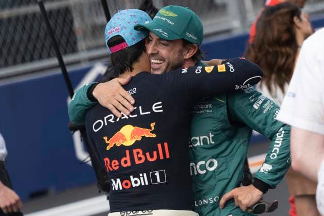 May 6, 2023, Miami, Florida, United States: SERGIO PEREZ (MEX) of Red Bull Racing 11 (left) celebrates with FERNANDO ALONSO (SPA) of Aston Martin 14 (right) after finishing P1 and P2. Checo finished on pole during a chaotic end to the Q3 session that saw Charles Leclerc spin into the barriers causing a red flag ending the qualifying session early. ..Teams prepare to compete in the second running of America s second calendar F1 race, with a record breaking three Grand Prix events to be held in America this year in Miami, Austin and Las Vegas, owing to the growing popularity of the thanks to Netflix s Drive to Survive Docuseries. Aston Martin, Ferrari and others plan on trying to challenge Red Bull Oracle Racing s Max Verstappen s dominance over the 2023 season. Motorsports, open wheel racing, Liberty Media. Miami United States - ZUMAb177 20230506_zap_b177_046 Copyright: xTaidghxBarronx