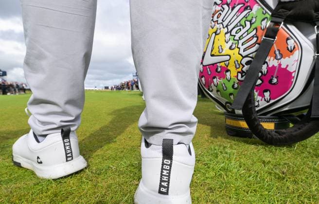 Mandatory Credit: Photo by Greig Cowie Shutterstock (14013394g) Jon Rahm on the 5th Tee Rahmbo shoe and Bag detail The British Open Championship, Practice, Golf, Royal Liverpool Golf Club, Liverpool, UK - 19 Jul 2023 The British Open Championship, Practice, Golf, Royal Liverpool Golf Club, Liverpool, UK - 19 Jul 2023 Copyright: xGreigxCowie Shutterstockx 14013394g