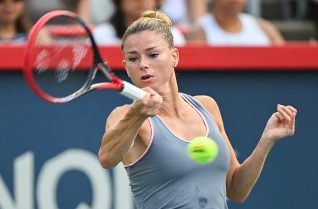 August 5, 2023, Montreal, PQ, Canada: Camila Giorgi, of Italy, plays a shot to Elvina Kalieva, from the United States, during their qualifying match at the National Bank Open tennis tournament in Montreal, Saturday, August 5, 2023. Camila Giorgi, Elvina Kalieva, - ZUMAc35_ 20230805_zaf_c35_036 Copyright: xGrahamxHughesx