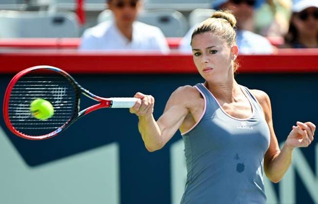 August 5, 2023, Montreal, PQ, Canada: Camila Giorgi, of Italy, plays a shot to Elvina Kalieva, from the United States, during their qualifying match at the National Bank Open tennis tournament in Montreal, Saturday, August 5, 2023. Camila Giorgi, Elvina Kalieva, - ZUMAc35_ 20230805_zaf_c35_037 Copyright: xGrahamxHughesx