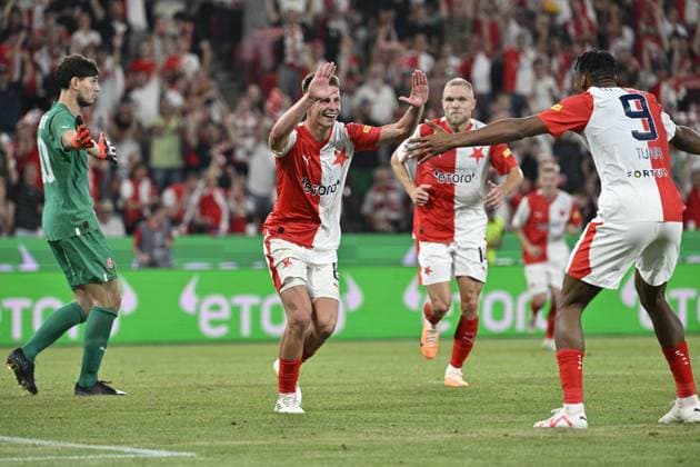 Lukas Masopust (Slavia), center, celebrates his goal (2:0) during the UEFA Europa League, play-off, 1st leg, SK Slavia Praha vs FC Zorya Luhansk, on August 24, 2023, in Prague, Czech Republic. On the right side is seen Muhamed Tijani (Slavia), 2nd from right Mick Van Buren (Slavia) and right goalkeeper Mykyta Turbayevskyi (Luhansk). (CTKxPhoto VitxSimanek) CTKPhotoP2023082408511 CTKPhotoP2023082408511