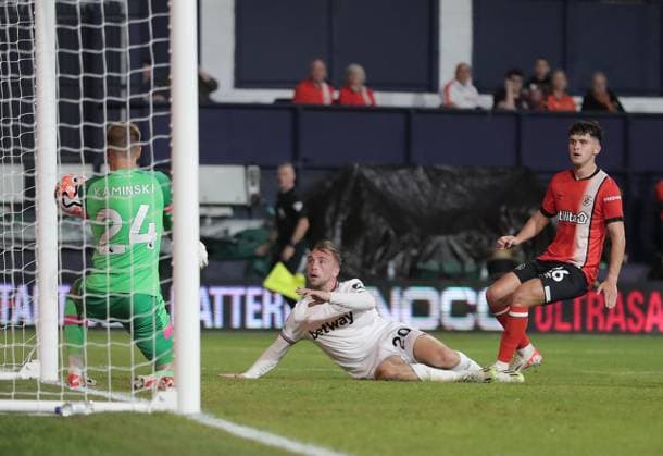 Mandatory Credit: Photo by Michael Zemanek Shutterstock (14074701s) Jarrod Bowen of West Ham United scores the opening goal past Thomas Kaminski of Luton Town Luton Town v West Ham United, Premier League, Football, Kenilworth Road, Luton, UK - 01 Sep 2023 EDITORIAL USE ONLY No use with unauthorised audio, video, data, fixture lists, club league logos or live services. Online in-match use limited to 120 images, no video emulation. No use in betting, games or single club league player publications. Luton Town v West Ham United, Premier League, Football, Kenilworth Road, Luton, UK - 01 Sep 2023 EDITORIAL USE ONLY No use with unauthorised audio, video, data, fixture lists, club league logos or live services. Online in-match use limited to 120 images, no video emulation. No use in betting, games or single club league player publications. Copyright: xMichaelxZemanek Shutterstockx 14074701s