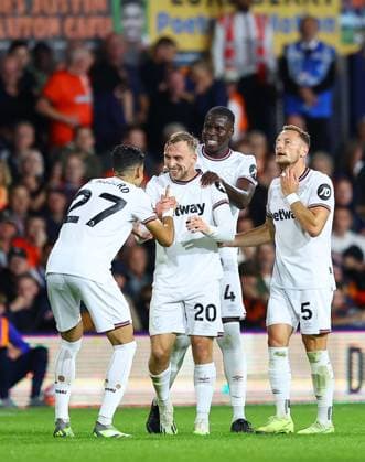 Mandatory Credit: Photo by Michael Zemanek Shutterstock (14074701v) Jarrod Bowen of West Ham United celebrates scoring the opening goal with team-mates Luton Town v West Ham United, Premier League, Football, Kenilworth Road, Luton, UK - 01 Sep 2023 EDITORIAL USE ONLY No use with unauthorised audio, video, data, fixture lists, club league logos or live services. Online in-match use limited to 120 images, no video emulation. No use in betting, games or single club league player publications. Luton Town v West Ham United, Premier League, Football, Kenilworth Road, Luton, UK - 01 Sep 2023 EDITORIAL USE ONLY No use with unauthorised audio, video, data, fixture lists, club league logos or live services. Online in-match use limited to 120 images, no video emulation. No use in betting, games or single club league player publications. Copyright: xMichaelxZemanek Shutterstockx 14074701v