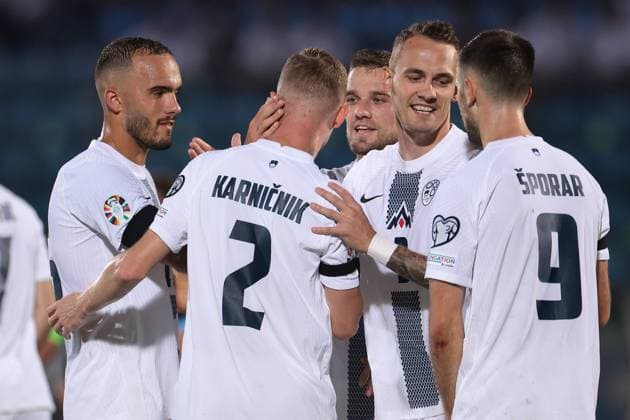 Serravalle, Italy, 10th September 2023. Zan Karnicnik of Slovenia celebrates with team mates after scoring to give the side a 4-0 lead during the UEFA EURO, EM, Europameisterschaft,Fussball 2024 match at San Marino Stadium, Serravalle. Picture credit should read: Jonathan Moscrop Sportimage EDITORIAL USE ONLY. No use with unauthorised audio, video, data, fixture lists, club league logos or live services. Online in-match use limited to 120 images, no video emulation. No use in betting, games or single club league player publications. SPI-2558-0020