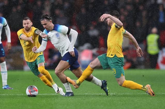 London, England, 13th October 2023. Jack Grealish of England takes on Martin Boyle and Ryan Strain of Australia during the International Friendly, Länderspiel, Nationalmannschaft match at Wembley Stadium, London. Picture credit should read: David Klein Sportimage EDITORIAL USE ONLY. No use with unauthorised audio, video, data, fixture lists, club league logos or live services. Online in-match use limited to 120 images, no video emulation. No use in betting, games or single club league player publications. SPI-2645-0023