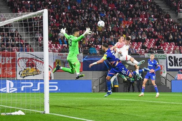 Football, Men, Season 2023 2024, UEFA Champions League Group G, Matchday 3 , RB Leipzig FK Red Star Belgrade, f l goalkeeper Omri Glazer FK Red Star Belgrade , Aleksandar Dragovic FK Red Star Belgrade , Yussuf Poulsen RB Leipzig and Christoph Baumgartner RB Leipzig in duel, 25 10 2023, Copyright: xSebastianxRäppold MatthiasxKochx