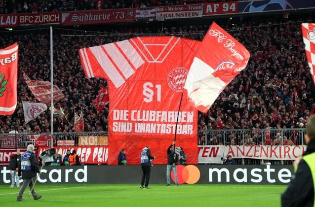 Munich, Germany 08 November 2023 Football, Men, Champions League, Matchday 4, Season 2023 2024, FC Bayern Munich Galatasaray Istanbul, Allianz Arena A jersey as a banner, choreography, choreography in the south curve with the message, The club colors are untouchable Âß1, FC Bayern Munich