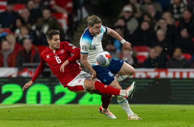 (231118) -- LONDON, Nov. 18, 2023 -- Conor Gallagher (R) of England is challenged by Matthew Guillaumier of Malta during the UEFA EURO, EM, Europameisterschaft,Fussball 2024 Group C qualification match between England and Malta in London, Britain on Nov. 17, 2023. FOR EDITORIAL USE ONLY. NOT FOR SALE FOR MARKETING OR ADVERTISING CAMPAIGNS. NO USE WITH UNAUTHORIZED AUDIO, VIDEO, DATA, FIXTURE LISTS, CLUB LEAGUE LOGOS OR LIVE SERVICES. ONLINE IN-MATCH USE LIMITED TO 45 IMAGES, NO VIDEO EMULATION. NO USE IN BETTING, GAMES OR SINGLE CLUB LEAGUE PLAYER PUBLICATIONS. (SP)BRITAIN-LONDON-FOOTBALL-UEFA EURO 2024-QUALIFIERS (Xinhua)