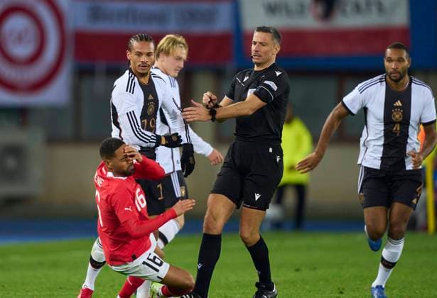 Leroy SANE, DFB 19 compete for the ball, tackling, duel, header, zweikampf, action, fight against Phillipp Mwene, AUT 16 , followed by red card for Leroy SANE, DFB 19 referee Slavko Vincic (SVN) in the friendly match AUSTRIA - GERMANY 2-0 ÖSTERREICH - DEUTSCHLAND 2-0 Preparation for European Championships 2024 Germany ,Season 2023 2024, on Nov 21, 2023 in Vienna, Austria.
