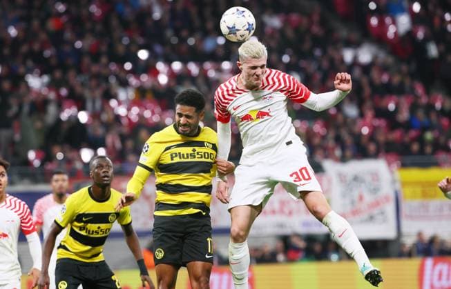RB Leipzig Young Boys Bern Champions League Leipzig, 13 12 2023, Red Bull Arena, Football , UEFA Champions League, Group G , Matchday 6, RB Leipzig vs Young Boys Bern , Pictured from left Saidy Janko 17, Bern , Benjamin Sesko 30, RB Leipzig , Photo for editorial use only , UEFA regulations prohibit any use of photographs as image sequences and or quasi video ,