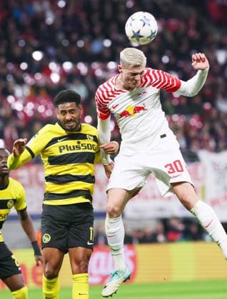 RB Leipzig Young Boys Bern Champions League Leipzig, 13 12 2023, Red Bull Arena, Football , UEFA Champions League, Group G , Matchday 6, RB Leipzig vs Young Boys Bern , Pictured from left Saidy Janko 17, Bern , Benjamin Sesko 30, RB Leipzig , Photo for editorial use only , UEFA regulations prohibit any use of photographs as image sequences and or quasi video ,