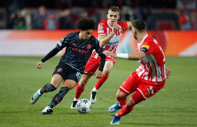 Rico Lewis of Manchester City on the ball Crvena zvezda v Manchester City, UEFA Champions League, Group G, Football, Rajko Mitic Stadium, Belgrade, Serbia - 13 Dec 2023 EDITORIAL USE ONLY No use with unauthorised audio, video, data, fixture lists, club league logos or live services. Online in-match use limited to 120 images, no video emulation. No use in betting, games or single club league player publications. Copyright: xNikolaxKrstic Shutterstockx 14254230bw