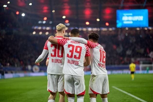 13 12 2023, Football, Men, Champions League, Group stage, 2023 2024, Group G, Matchday 6, RB Leipzig BSC Young Boys Bern f l n r Benjamin Sesko 30, RB Leipzig , Benjamin Henrichs 39, RB Leipzig , Fabio Carvalho 18, RB Leipzig , rear view, celebrating a goal Leipzig Red Bull Arena Saxony Germany