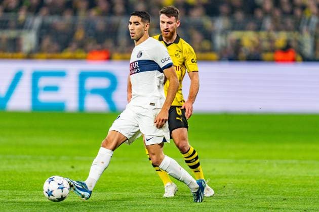 Achraf Hakimi Paris Saint Germain, 2 Salih Oezcan Borussia Dortmund, 6 Borussia Dortmund vs Paris Saint Germain, Football, UEFA Champions League, Matchday 6, 13 12 2023 DFL REGULATIONS PROHIBIT ANY OUSE OF PHOTOGRAPHS AS IMAGE SEQUENCES AND OR QUASI VIDEO Borussia Dortmund vs Paris Saint Germain, Football, UEFA Champions League, Matchday 6, 13 12 2023 Dortmund Copyright: xEibner-Pressefoto BahhoxKarax EP_BVB