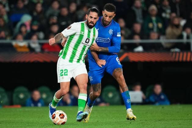 Isco Alarcon of Real Betis and Connor Goldson of Rangers FC Real Betis v Rangers, UEFA Europa League, Group C, Football, Benito VIllamarin Stadium, Seville, Spain - 14 Dec 2023 EDITORIAL USE ONLY No use with unauthorised audio, video, data, fixture lists, club league logos or live services. Online in-match use limited to 120 images, no video emulation. No use in betting, games or single club league player publications. Copyright: xBaguxBlanco Shutterstockx 14254285co