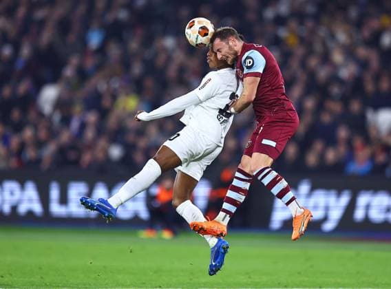 Vladimir Coufal of West Ham United battles with Junior Adamu of SC Freiburg West Ham United v Freiburg, UEFA Europa League, Group A, Football, London Arena, London, UK - 14 Dec 2023 EDITORIAL USE ONLY No use with unauthorised audio, video, data, fixture lists, club league logos or live services. Online in-match use limited to 120 images, no video emulation. No use in betting, games or single club league player publications. Copyright: xMichaelxZemanek Shutterstockx 14254605ax
