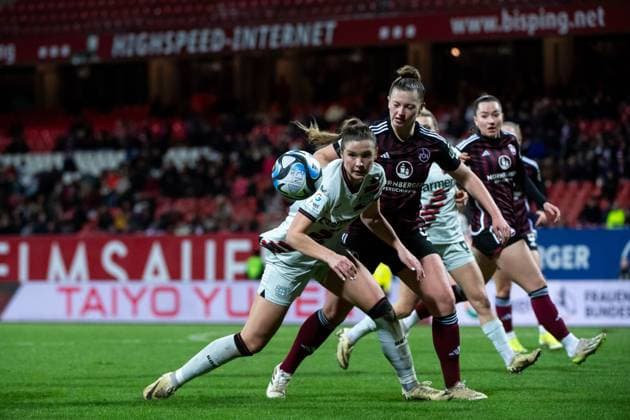 Karolina Lea Vilhjalmsdottir Bayer 04 Leverkusen, 18 in duel with Jessica May FC Nuernberg, 06 , GER, FC Nuernberg vs Bayer 04 Leverkusen, Football Google Pixel Womens Bundesliga, Matchday 13, Season 2023 2024, 12 02 2024 DFB regulations prohibit any use of photographs as image sequences and or quasi video GER, FC Nuernberg vs Bayer 04 Leverkusen, Football Google Pixel Womens Bundesliga, Matchday 13, Season 2023 2024, 12 02 2024 Nuernberg Copyright: xEibner-Pressefoto Memmlerx EP_MMR