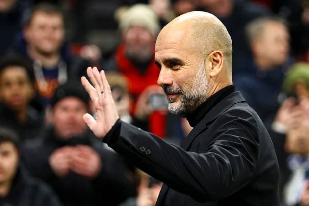 Manchester City manager Pep Guardiola greets supports before the match FC Copenhagen v Manchester City, UEFA Champions League, Round of 16, First Leg, Football, Parken Stadium, Copenhagen, Denmark - 13 Feb 2024 EDITORIAL USE ONLY No use with unauthorised audio, video, data, fixture lists, club league logos or live services. Online in-match use limited to 120 images, no video emulation. No use in betting, games or single club league player publications. Copyright: xKieranxMcManus Shutterstockx 14343227e