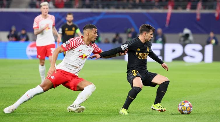 RB Leipzig Real Madrid Champions League Leipzig, 13 02 2024, Red Bull Arena, Football, UEFA Champions League, Round of 16 , RB Leipzig vs Real Madrid , Pictured from left Benjamin Henrichs 39, RB Leipzig , Brahim Diaz 21, Real , Only editorial use , UEFA regulations prohibit any use of photographs as image sequences and or quasi video ,
