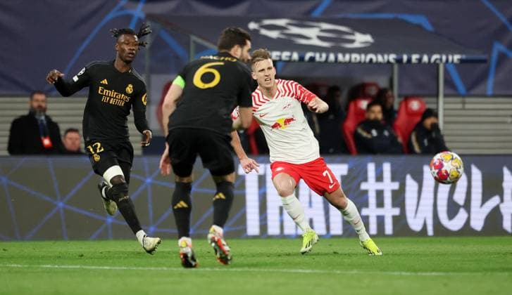 RB Leipzig Real Madrid Champions League Leipzig, 13 02 2024, Red Bull Arena, Champions League, Round of 16 , RB Leipzig vs Real Madrid , In the picture from l Eduardo Camavinga 12, Real , Nacho Fernandez 6, Real and Dani Olmo 7, RB Leipzig , Picture Point
