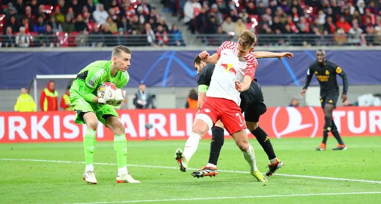 RB Leipzig Real Madrid Champions League Leipzig, 13 02 2024, Red Bull Arena, Champions League, Round of 16 , RB Leipzig vs Real Madrid , In the picture from l goalkeeper Andriy Lunin 13, Real , Dani Olmo 7, RB Leipzig and Nacho Fernandez 6, Real , Picture Point