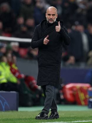 Copenhagen, Denmark, 13th February 2024. Pep Guardiola, Manager of Manchester City gives players a thumbs up during the UEFA Champions League match at Telia Parken, Copenhagen. Picture credit should read: Paul Terry Sportimage EDITORIAL USE ONLY. No use with unauthorised audio, video, data, fixture lists, club league logos or live services. Online in-match use limited to 120 images, no video emulation. No use in betting, games or single club league player publications. SPI-2935-0032